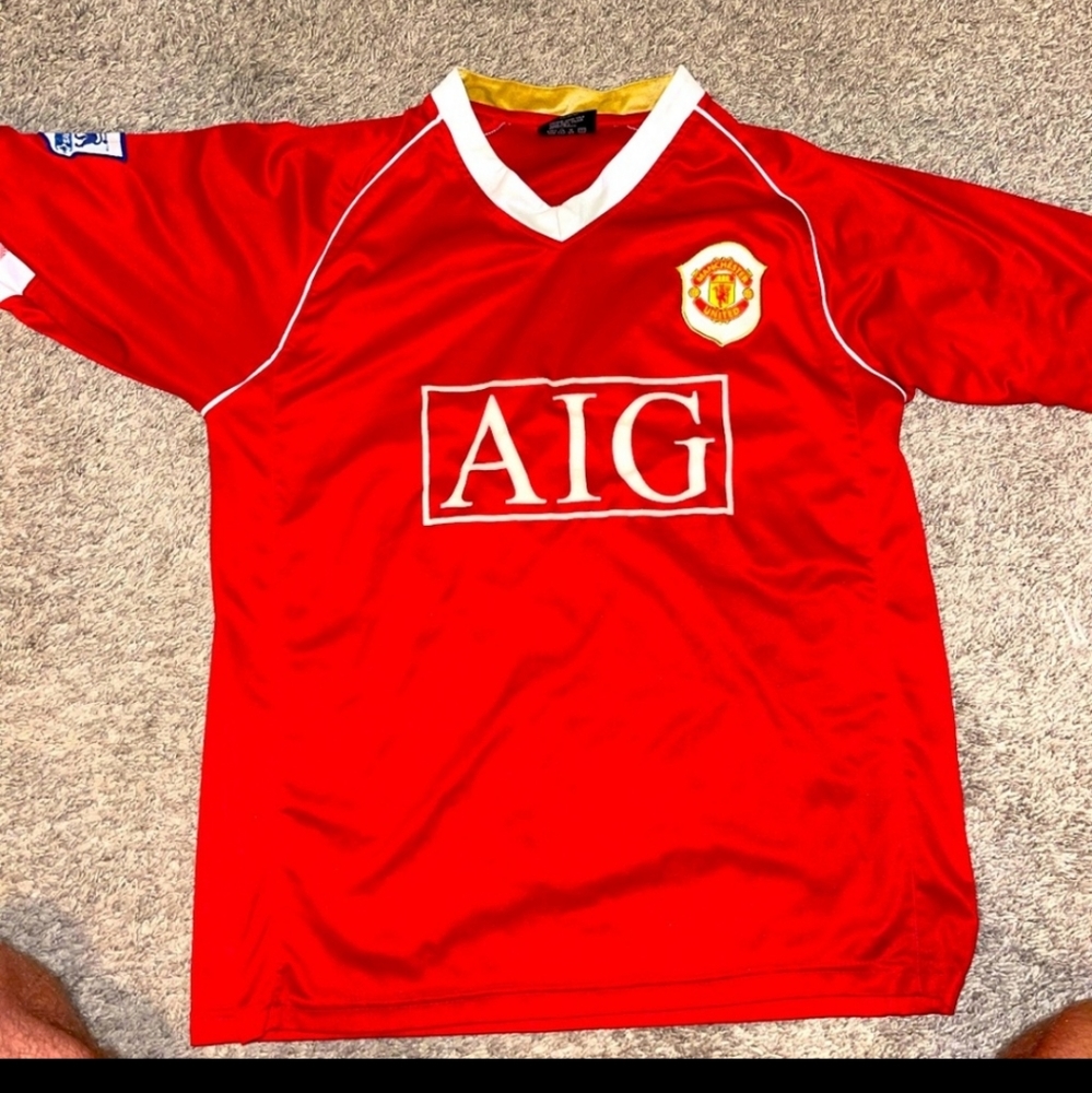 Manchester United M jersey, Barclays, AIG.
